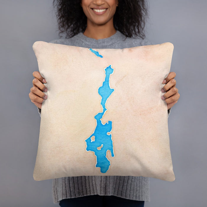 Person holding 18x18 Custom Priest Lake Idaho Map Throw Pillow in Watercolor