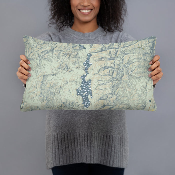 Person holding 20x12 Custom Priest Lake Idaho Map Throw Pillow in Woodblock