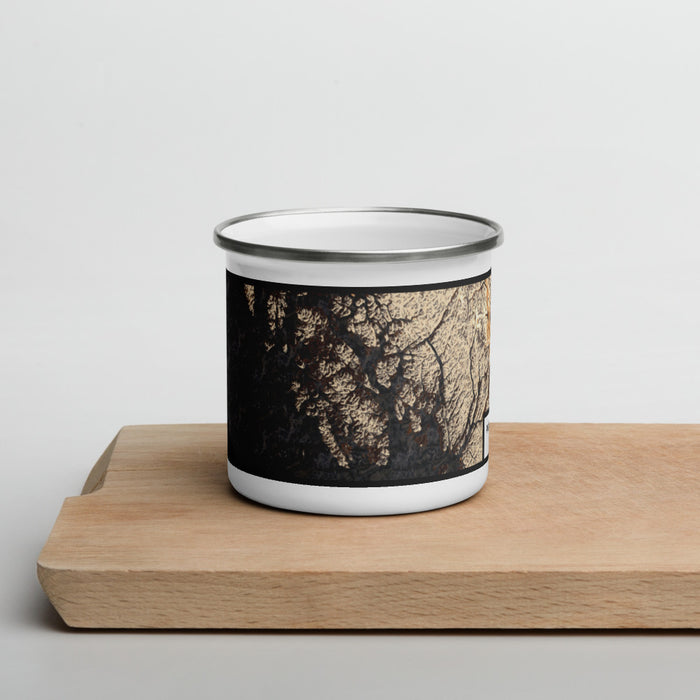Front View Custom Prince of Wales Island Alaska Map Enamel Mug in Ember on Cutting Board