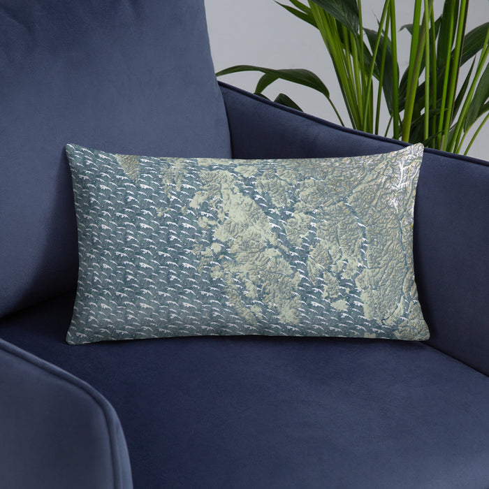Custom Prince of Wales Island Alaska Map Throw Pillow in Woodblock on Blue Colored Chair