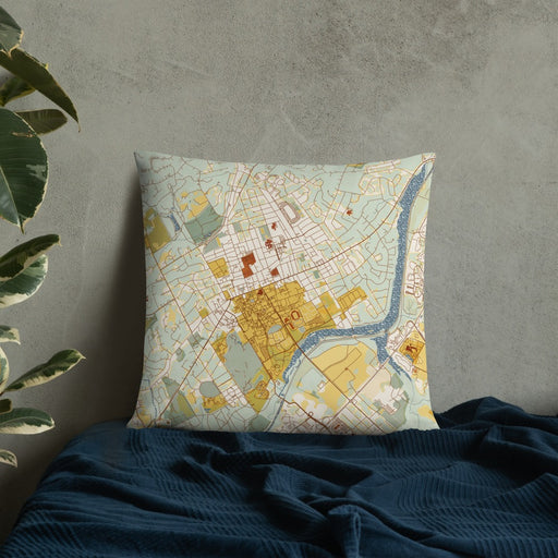 Custom Princeton New Jersey Map Throw Pillow in Woodblock on Bedding Against Wall