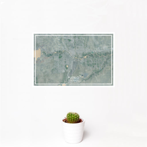 12x18 Pueblo Colorado Map Print Landscape Orientation in Afternoon Style With Small Cactus Plant in White Planter