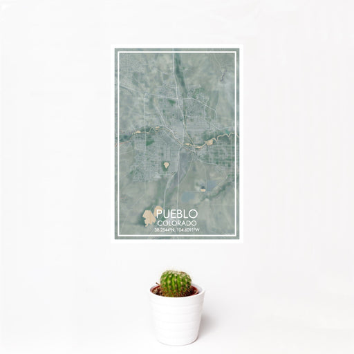 12x18 Pueblo Colorado Map Print Portrait Orientation in Afternoon Style With Small Cactus Plant in White Planter