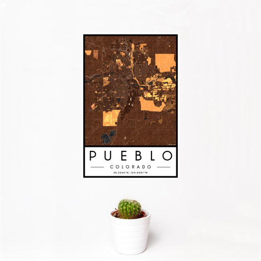 12x18 Pueblo Colorado Map Print Portrait Orientation in Ember Style With Small Cactus Plant in White Planter