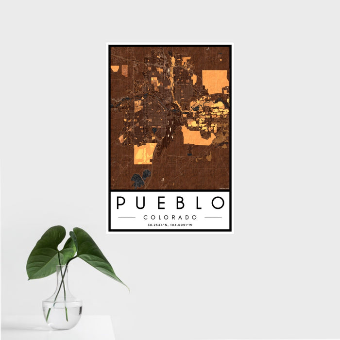 16x24 Pueblo Colorado Map Print Portrait Orientation in Ember Style With Tropical Plant Leaves in Water