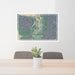 24x36 Puget Sound Washington Map Print Lanscape Orientation in Afternoon Style Behind 2 Chairs Table and Potted Plant