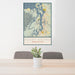 24x36 Puget Sound Washington Map Print Portrait Orientation in Woodblock Style Behind 2 Chairs Table and Potted Plant