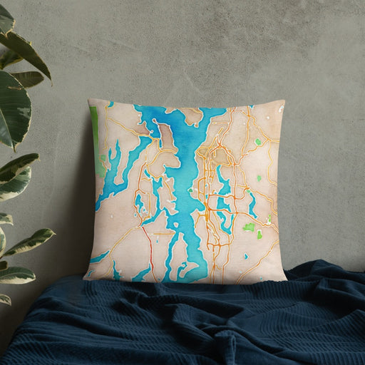 Custom Puget Sound Washington Map Throw Pillow in Watercolor on Bedding Against Wall