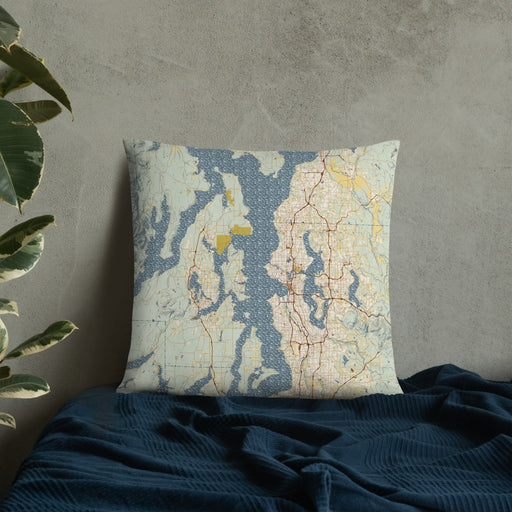 Custom Puget Sound Washington Map Throw Pillow in Woodblock on Bedding Against Wall