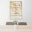24x36 Puyallup Washington Map Print Portrait Orientation in Woodblock Style Behind 2 Chairs Table and Potted Plant