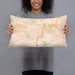 Person holding 20x12 Custom Puyallup Washington Map Throw Pillow in Watercolor