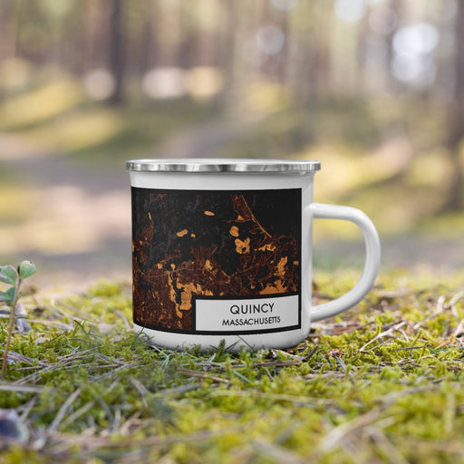 Right View Custom Quincy Massachusetts Map Enamel Mug in Ember on Grass With Trees in Background