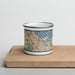 Front View Custom Quincy Massachusetts Map Enamel Mug in Woodblock on Cutting Board