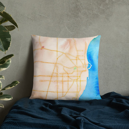Custom Racine Wisconsin Map Throw Pillow in Watercolor on Bedding Against Wall