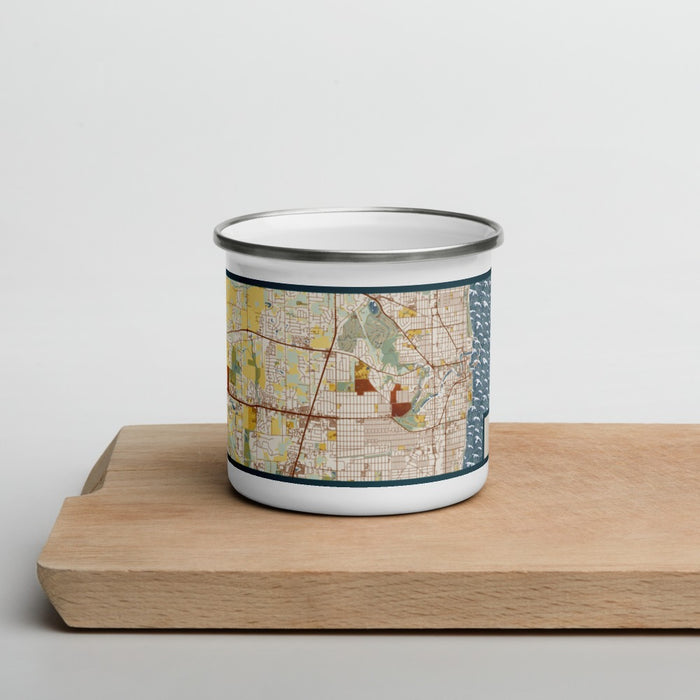 Front View Custom Racine Wisconsin Map Enamel Mug in Woodblock on Cutting Board