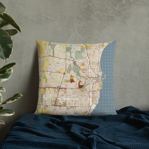 Custom Racine Wisconsin Map Throw Pillow in Woodblock on Bedding Against Wall