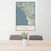 24x36 Ragged Point California Map Print Portrait Orientation in Woodblock Style Behind 2 Chairs Table and Potted Plant