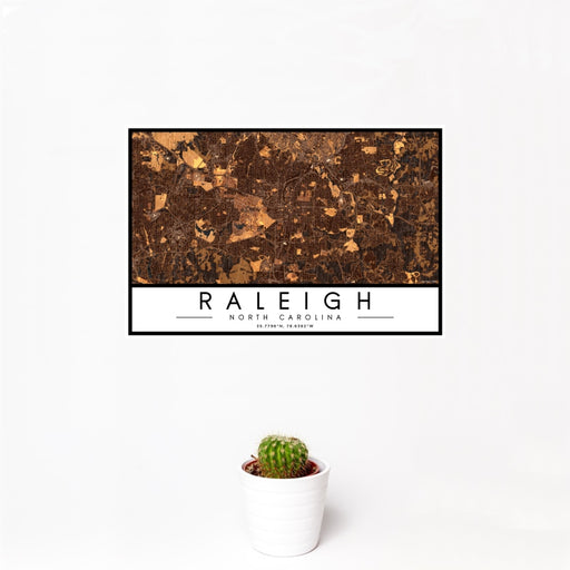 12x18 Raleigh North Carolina Map Print Landscape Orientation in Ember Style With Small Cactus Plant in White Planter