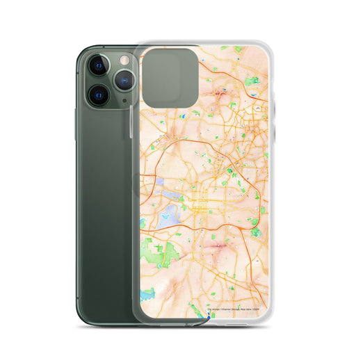 Custom Raleigh North Carolina Map Phone Case in Watercolor on Table with Laptop and Plant
