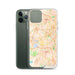Custom Raleigh North Carolina Map Phone Case in Watercolor on Table with Laptop and Plant