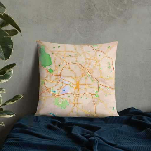 Custom Raleigh North Carolina Map Throw Pillow in Watercolor on Bedding Against Wall