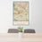 24x36 Raleigh North Carolina Map Print Portrait Orientation in Woodblock Style Behind 2 Chairs Table and Potted Plant