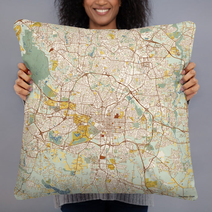Person holding 22x22 Custom Raleigh North Carolina Map Throw Pillow in Woodblock