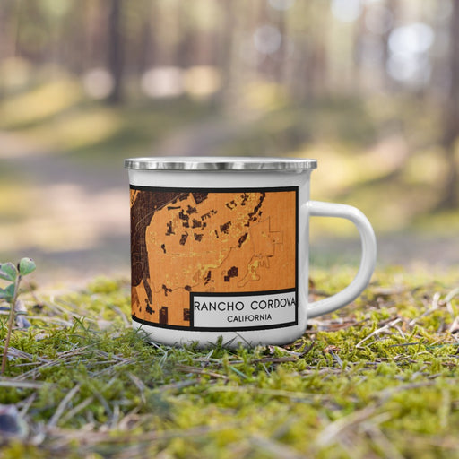 Right View Custom Rancho Cordova California Map Enamel Mug in Ember on Grass With Trees in Background