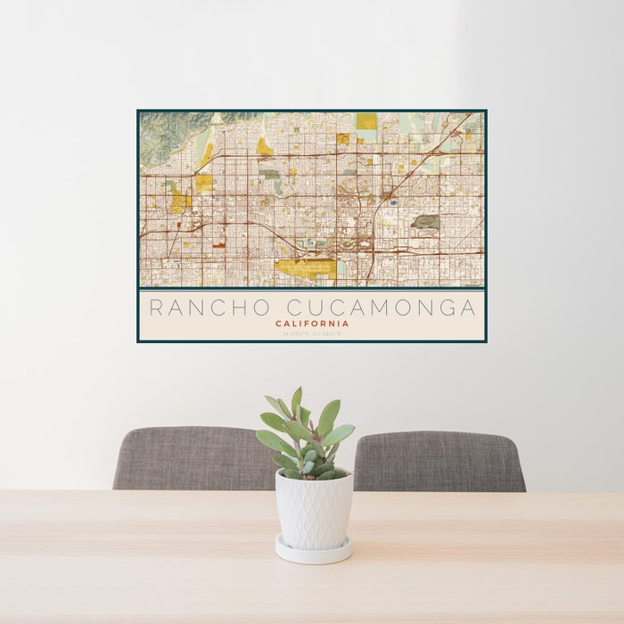 24x36 Rancho Cucamonga California Map Print Landscape Orientation in Woodblock Style Behind 2 Chairs Table and Potted Plant