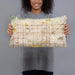 Person holding 20x12 Custom Rancho Cucamonga California Map Throw Pillow in Woodblock