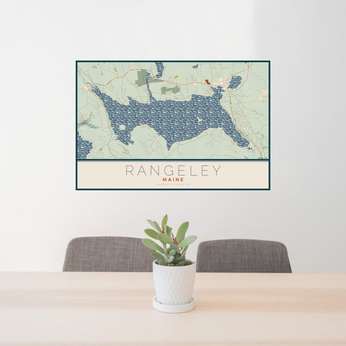 24x36 Rangeley Maine Map Print Lanscape Orientation in Woodblock Style Behind 2 Chairs Table and Potted Plant