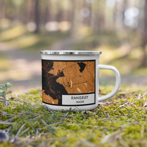 Right View Custom Rangeley Maine Map Enamel Mug in Ember on Grass With Trees in Background
