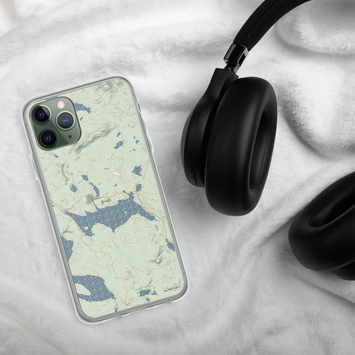 Custom Rangeley Maine Map Phone Case in Woodblock on Table with Black Headphones