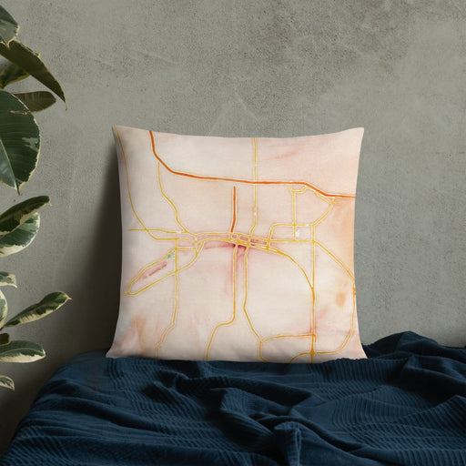 Custom Rapid City South Dakota Map Throw Pillow in Watercolor on Bedding Against Wall