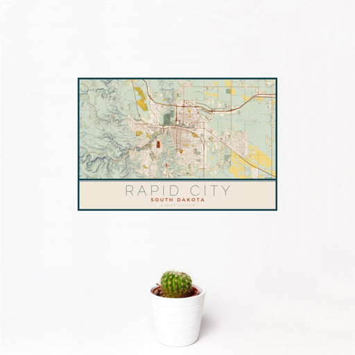12x18 Rapid City South Dakota Map Print Landscape Orientation in Woodblock Style With Small Cactus Plant in White Planter