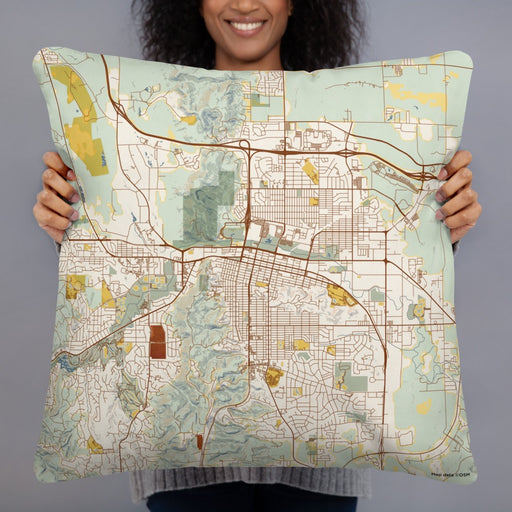Person holding 22x22 Custom Rapid City South Dakota Map Throw Pillow in Woodblock