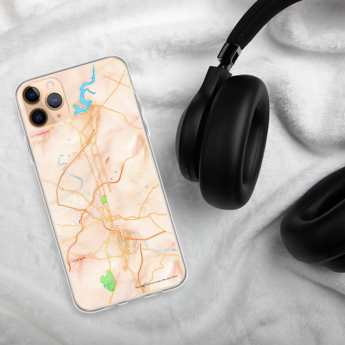 Custom Reading Pennsylvania Map Phone Case in Watercolor on Table with Black Headphones