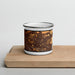 Front View Custom Redlands California Map Enamel Mug in Ember on Cutting Board