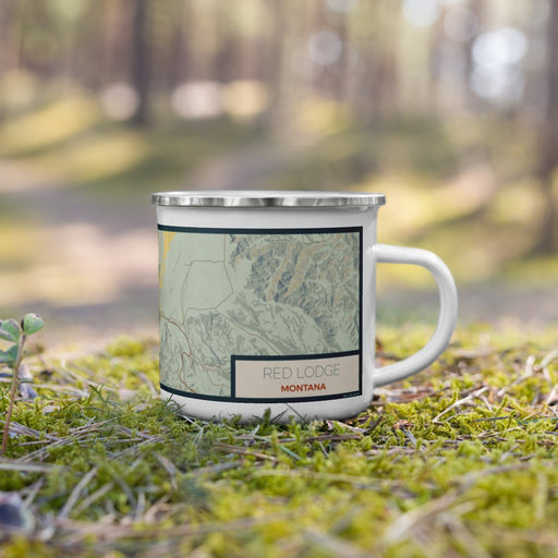Right View Custom Red Lodge Montana Map Enamel Mug in Woodblock on Grass With Trees in Background