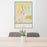 24x36 Redmond Oregon Map Print Portrait Orientation in Woodblock Style Behind 2 Chairs Table and Potted Plant