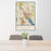 24x36 Redmond Washington Map Print Portrait Orientation in Woodblock Style Behind 2 Chairs Table and Potted Plant