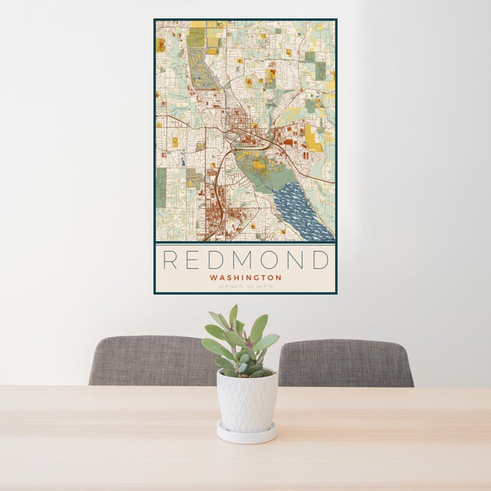 24x36 Redmond Washington Map Print Portrait Orientation in Woodblock Style Behind 2 Chairs Table and Potted Plant