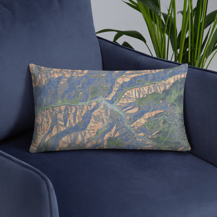 Custom Red River New Mexico Map Throw Pillow in Afternoon on Blue Colored Chair