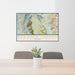 24x36 Red Rock Canyon Nevada Map Print Lanscape Orientation in Woodblock Style Behind 2 Chairs Table and Potted Plant