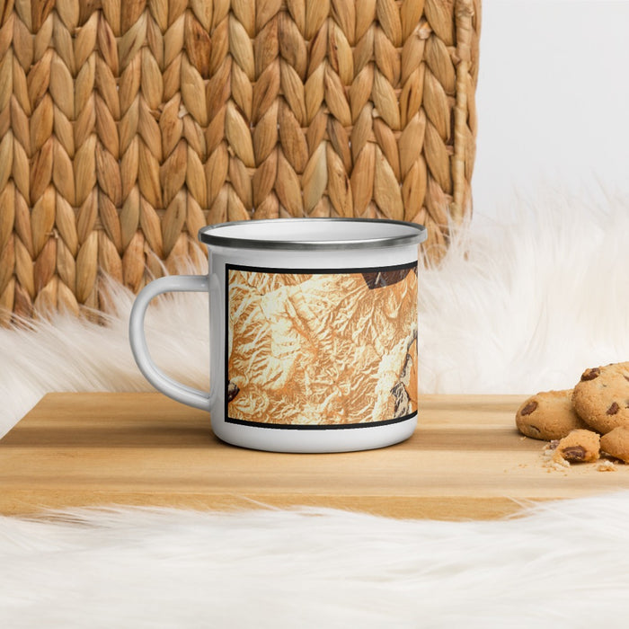Left View Custom Red Rock Canyon Nevada Map Enamel Mug in Ember on Table Top