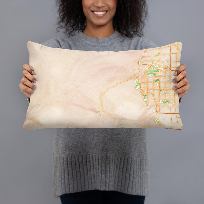 Person holding 20x12 Custom Red Rock Canyon Nevada Map Throw Pillow in Watercolor