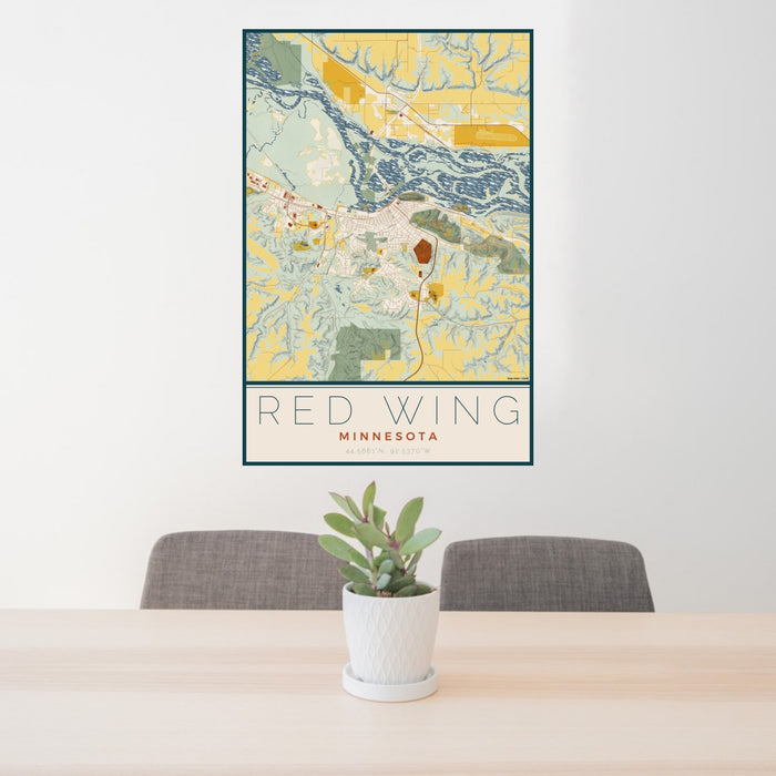 24x36 Red Wing Minnesota Map Print Portrait Orientation in Woodblock Style Behind 2 Chairs Table and Potted Plant