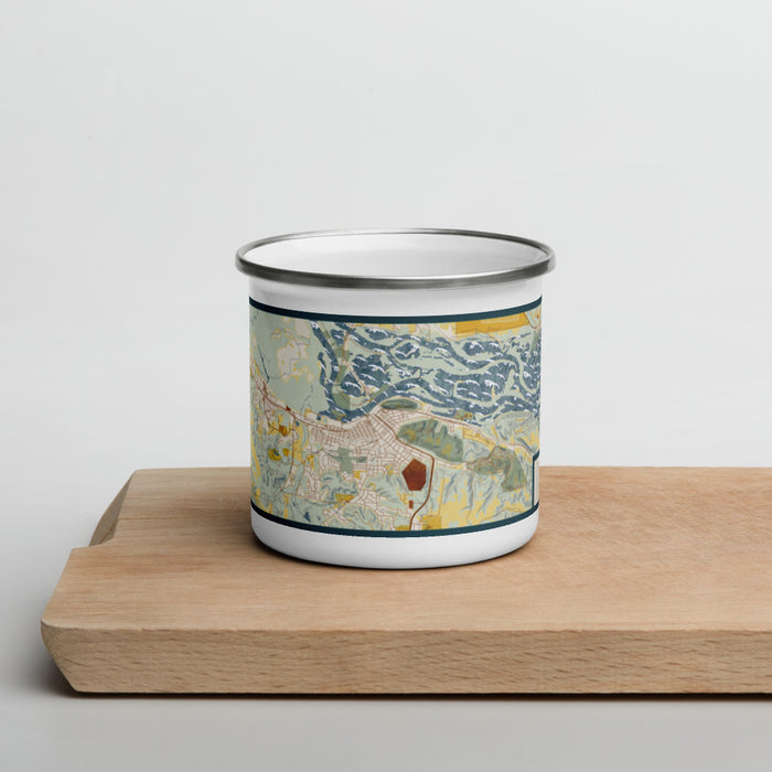 Front View Custom Red Wing Minnesota Map Enamel Mug in Woodblock on Cutting Board