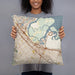 Person holding 18x18 Custom Redwood City California Map Throw Pillow in Woodblock