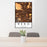 24x36 Reno Nevada Map Print Portrait Orientation in Ember Style Behind 2 Chairs Table and Potted Plant
